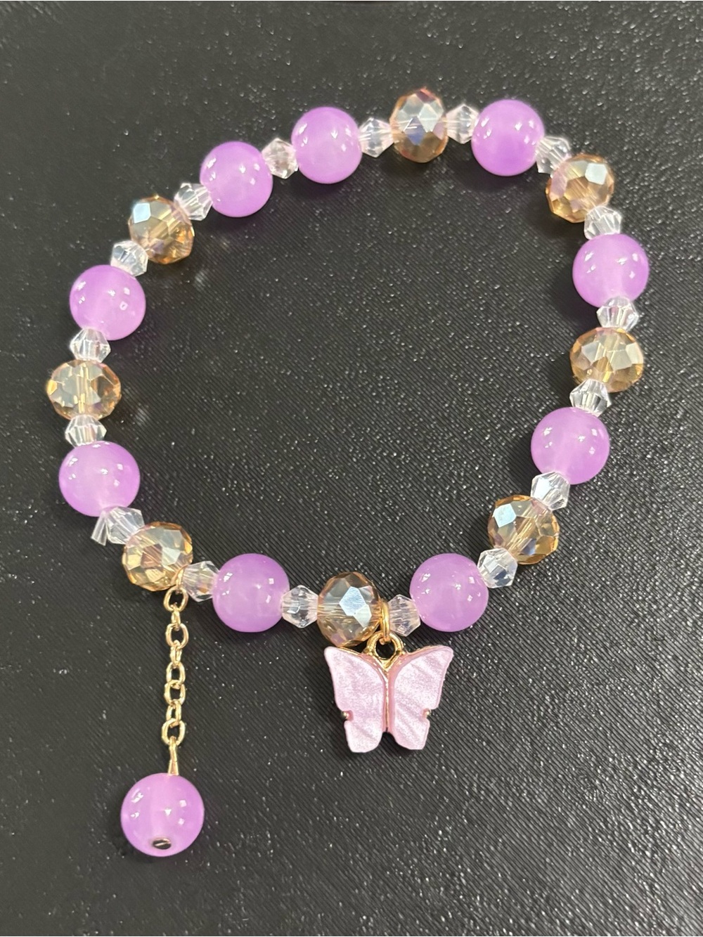 5/$25 (Pick 5 items for $25 Labeled) Butterfly Beaded Stretch Bracelet